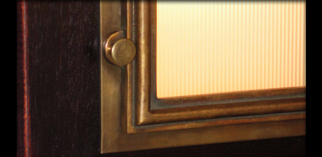 Detail of cast bronze sconce
